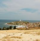 Farol de Santa Marta, aldea y Faro de fondo